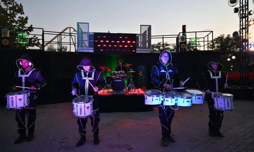 Illuminated drummers performing at Wonderland