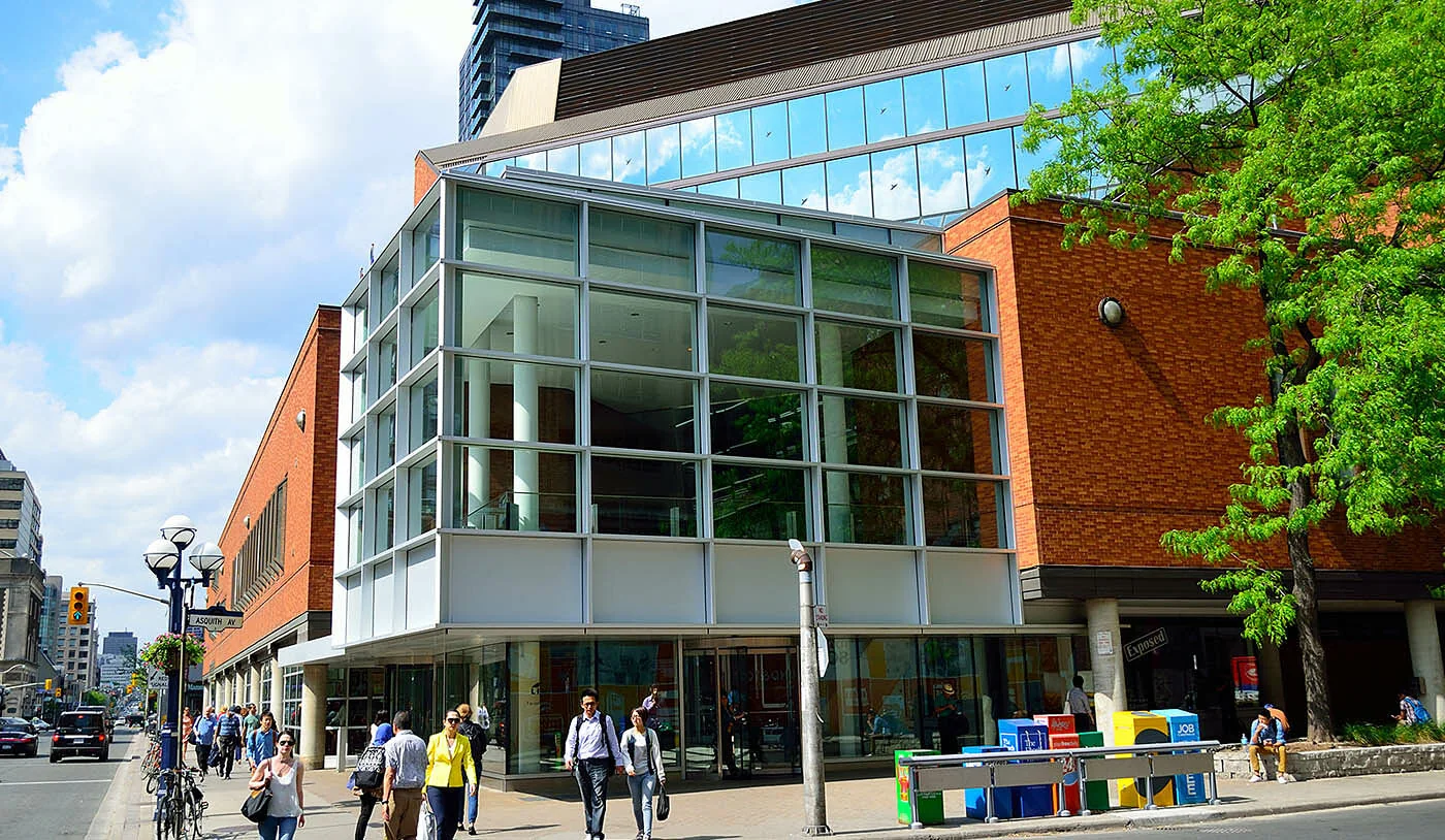 The glass and brick entrance of Toronto Reference Library