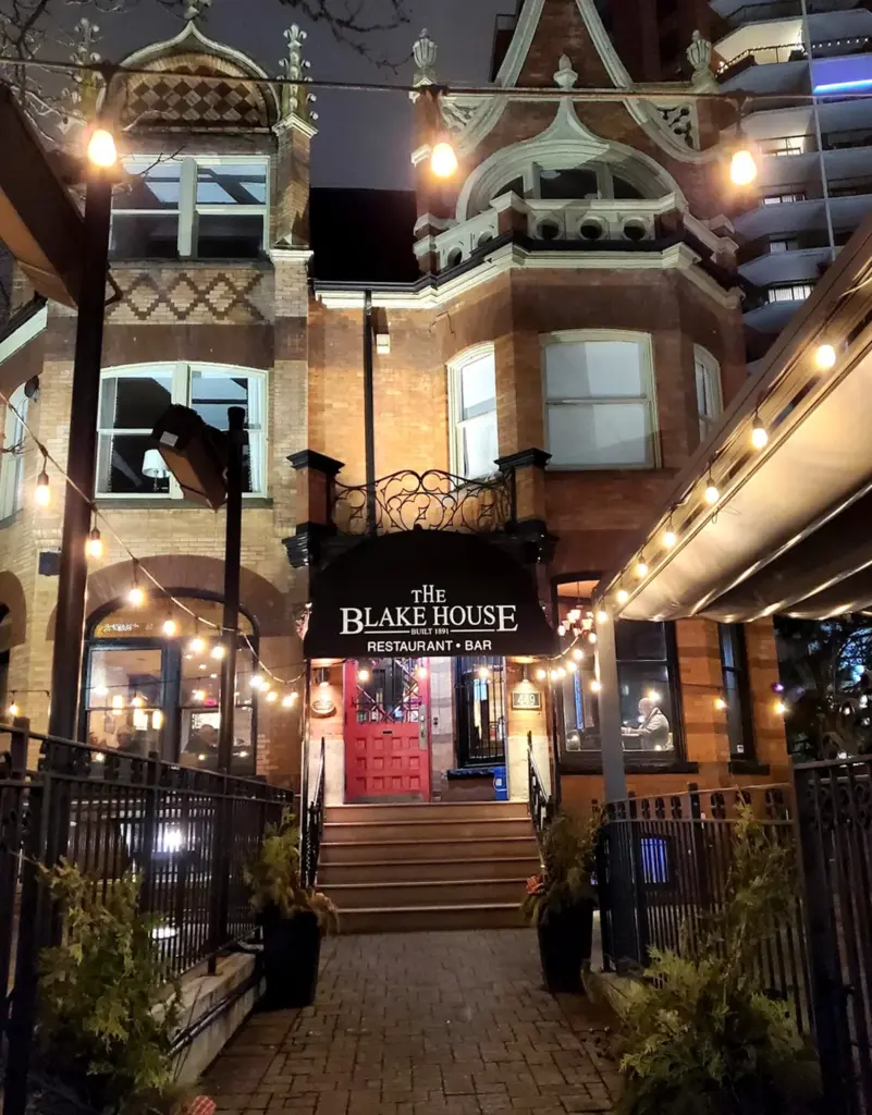 The Blake House entrance lit at night