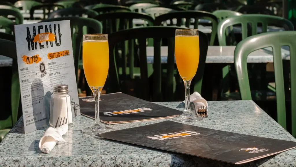 Two beers on a patio table at Hemingways