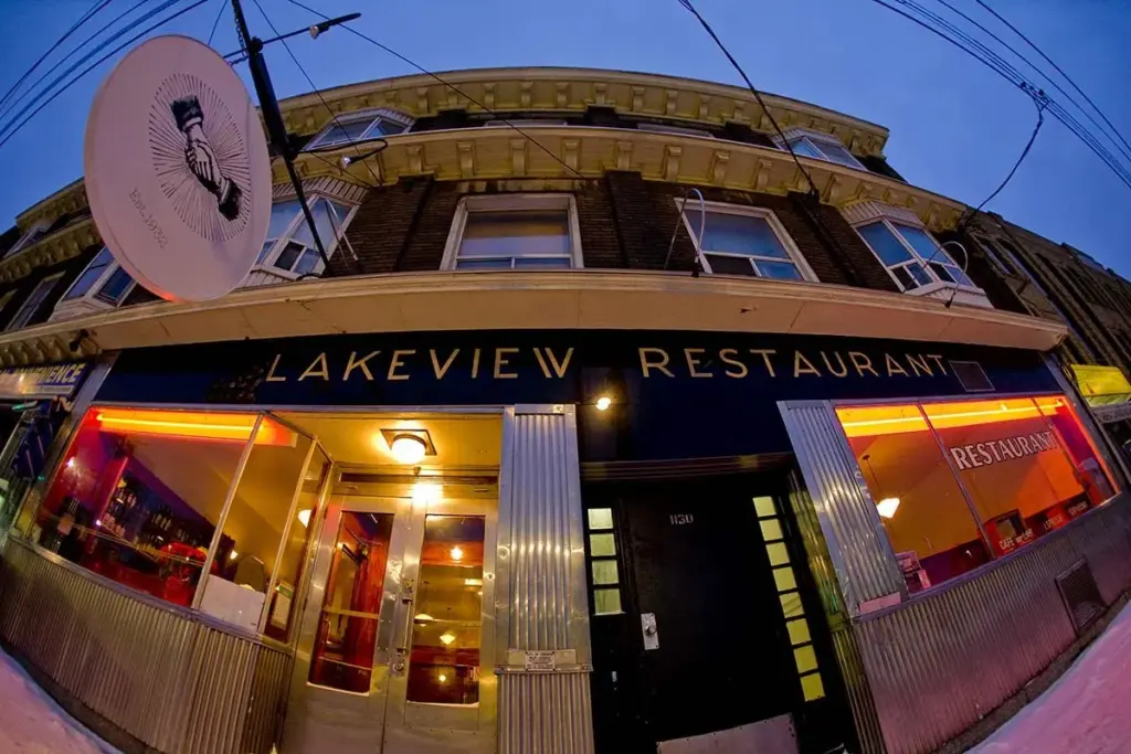 The Lakeview Restaurant entrance lit up at dusk