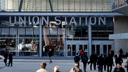 Travellers enter and leave Union Station at its Front Street entrance