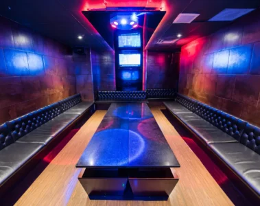 A private room at Bar+ with purple and blue lighting
