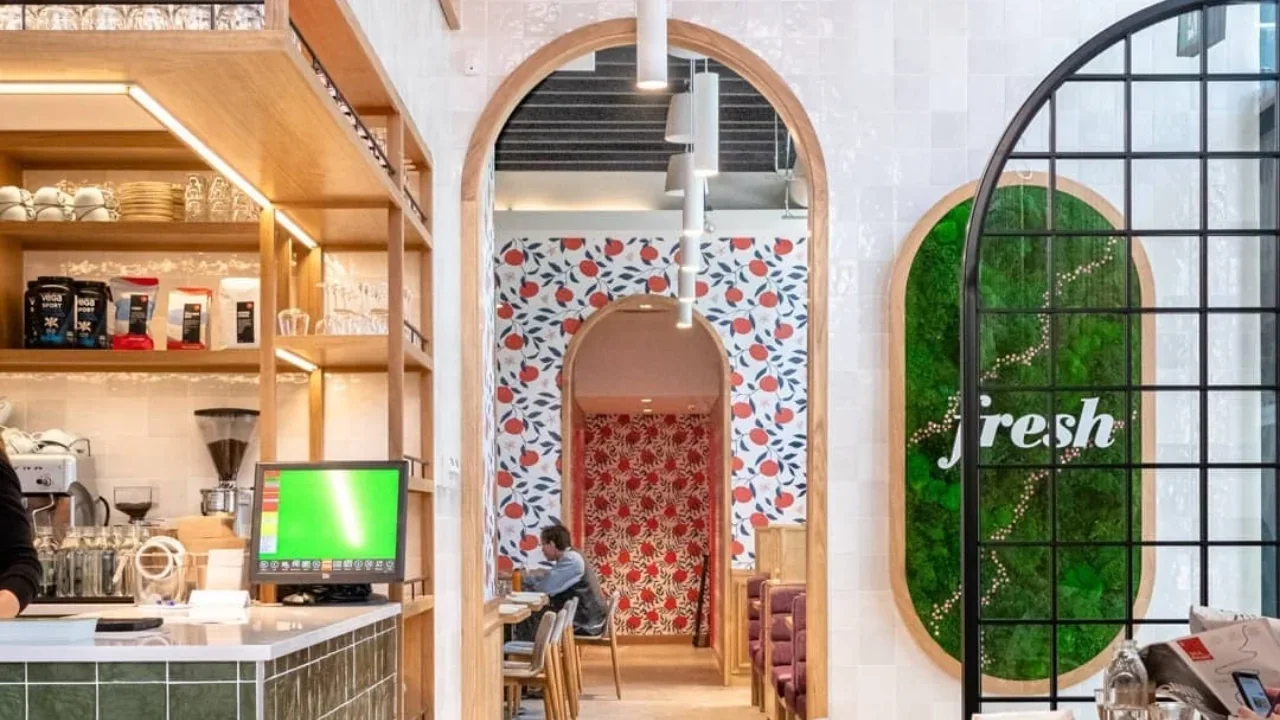 Fresh Eglinton’s counter, doorway and seating shown in a three-part photograph