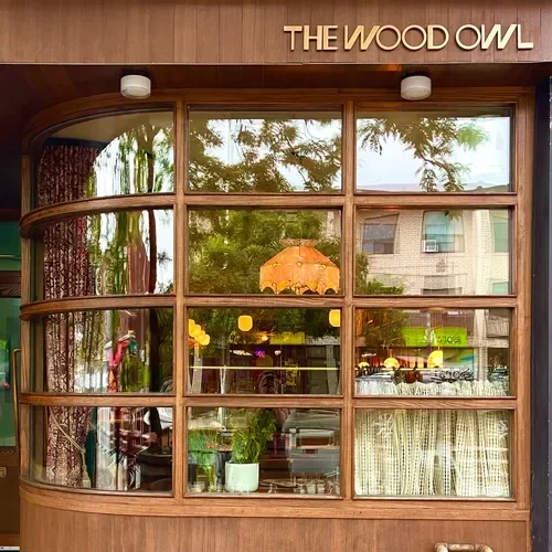 The Wood Owl’s front window and entrance