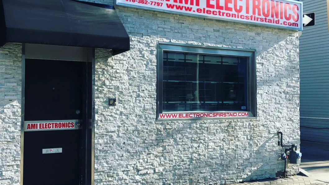 AMI Electronics’ stone-faced storefront and entrance