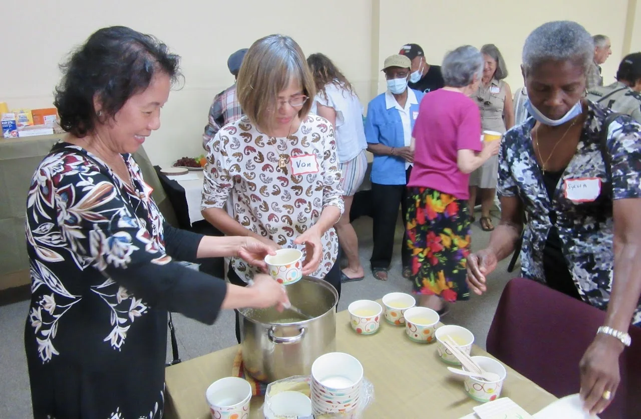 Members of Oakwood Vaughan Oasis share tea at a community gathering