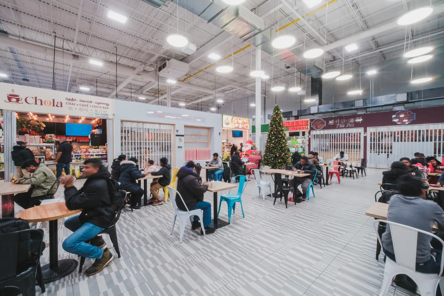 Tables and food counters inside Majestic City’s food court