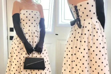 Two views of a woman wearing a polka-dot dress with a lace-up back