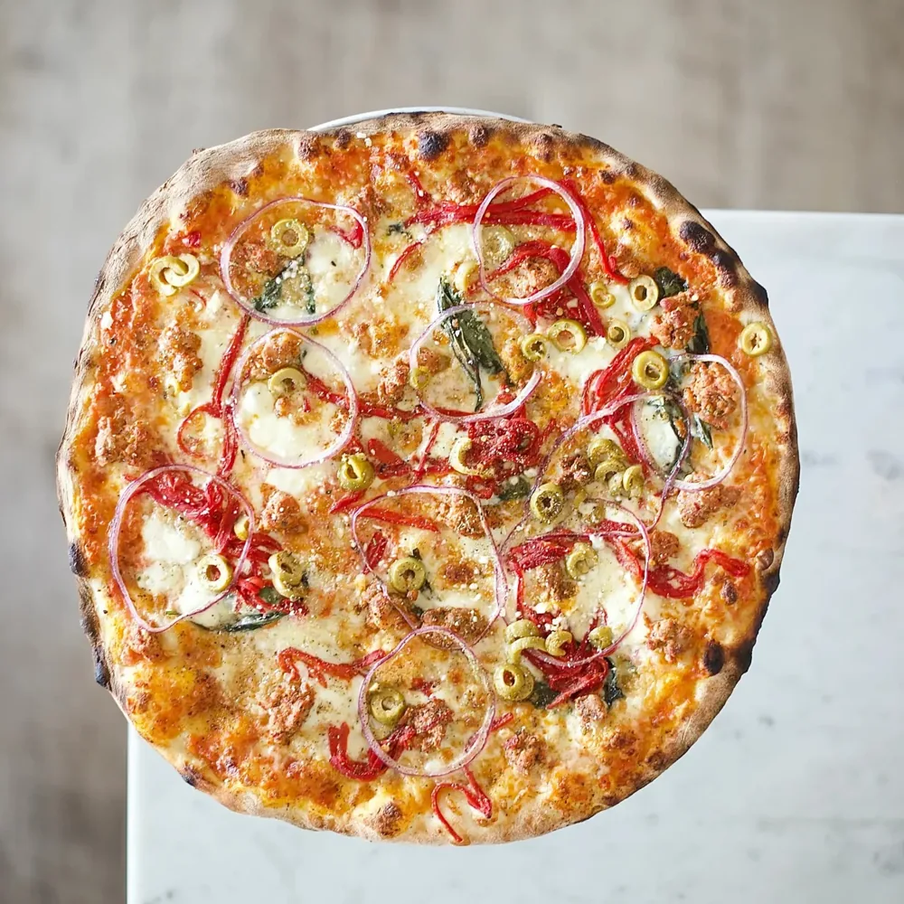 A topped pizza from Bello Pizza