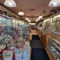 Candy displays and chocolate counters inside the Nutty Chocolatier Beaches shop