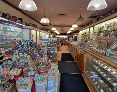 Candy displays and chocolate counters inside the Nutty Chocolatier Beaches shop