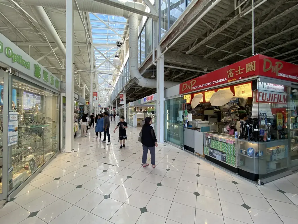 Busy indoor aisles and small shops inside Pacific Mall