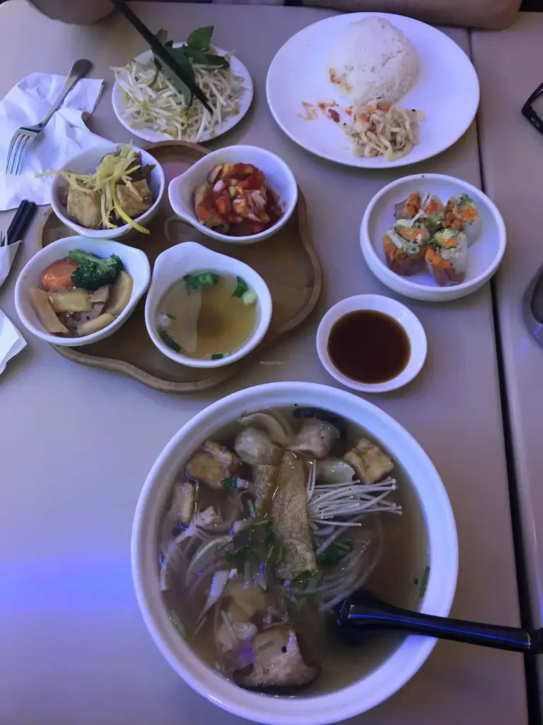 Vegan pho, spring rolls, rice and small dishes served at Saigon Lotus in Toronto