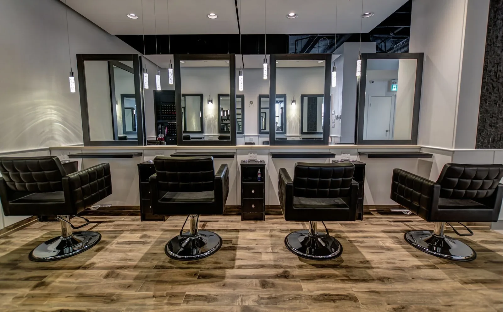 Styling chairs and mirrors inside CL Salon.