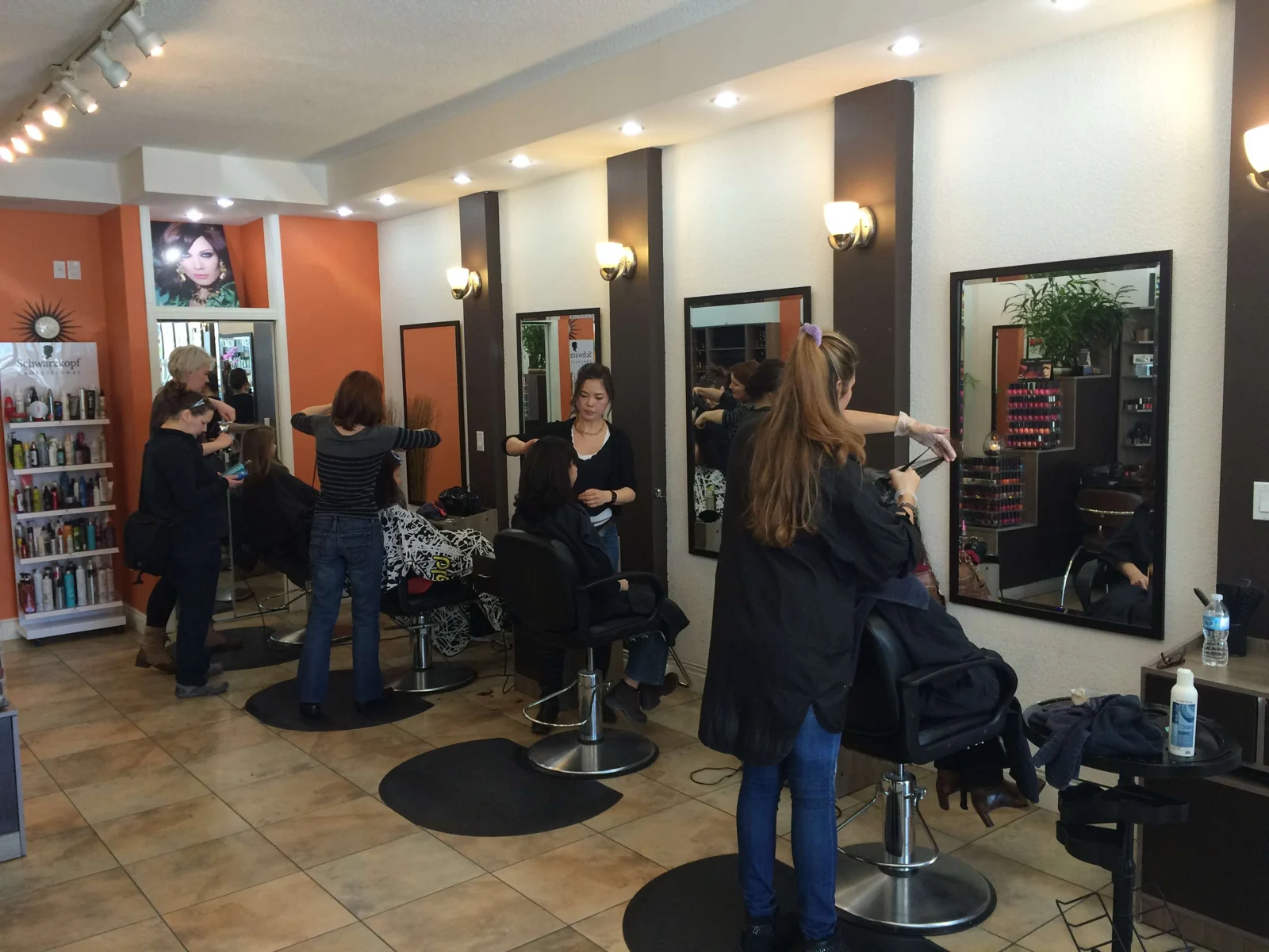 Chairs and mirrors inside Hair Play Salon.