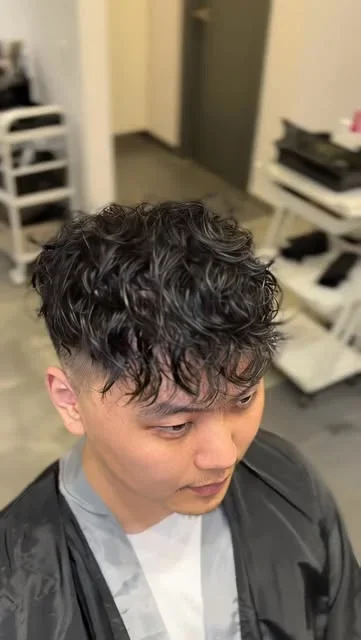 Short textured haircut shared by HairTree stylist O.N.E.