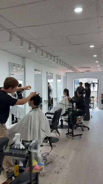 Stylists working with clients at HairTree Yorkville.
