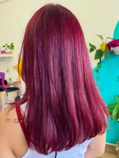 Straight magenta hair in LES Studio’s shared portfolio.