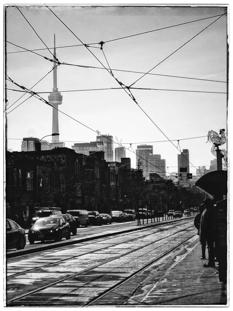 TTC streetcar travelling in a reserved centre lane on Spadina Avenue