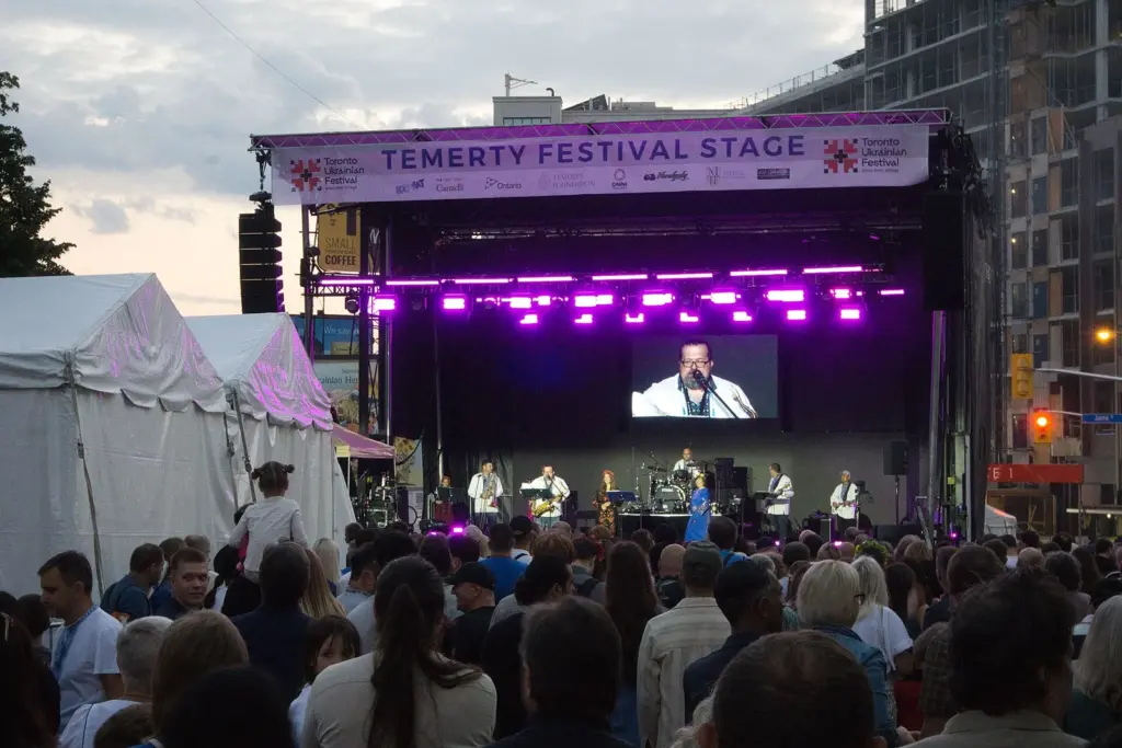 Large crowd watching an outdoor concert in Toronto