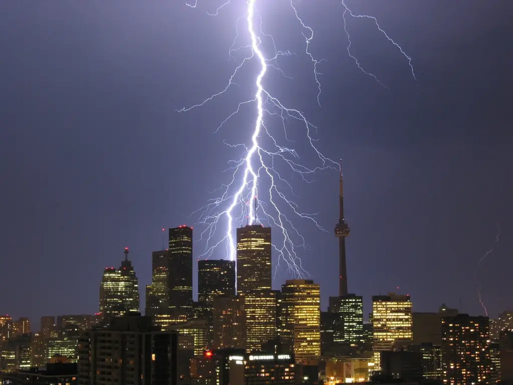 Lightning flashing over Toronto's skyline at night
