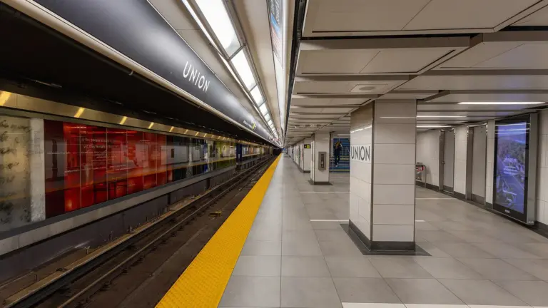 Passengers waiting on a modern TTC subway station platform