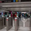 PRESTO card readers on fare gates inside a Toronto subway station