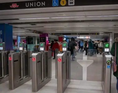PRESTO card readers on fare gates inside a Toronto subway station