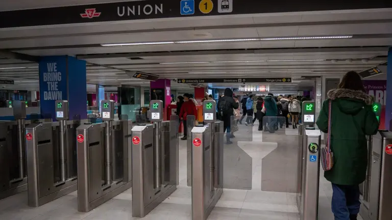 PRESTO card readers on fare gates inside a Toronto subway station
