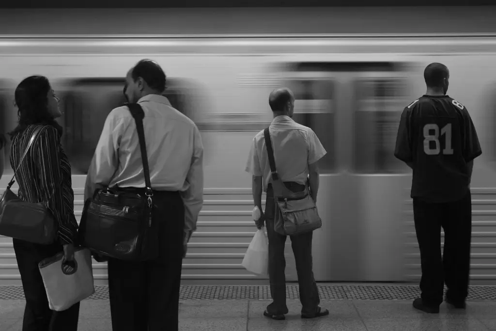 Passengers waiting on a TTC subway platform in Toronto