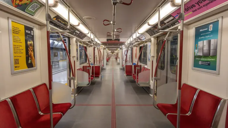 Modern TTC subway train arriving at a Toronto station platform