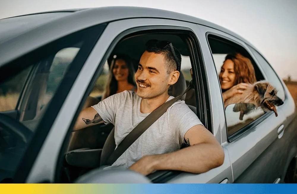 A family seated in a car in a 407 ETR photograph