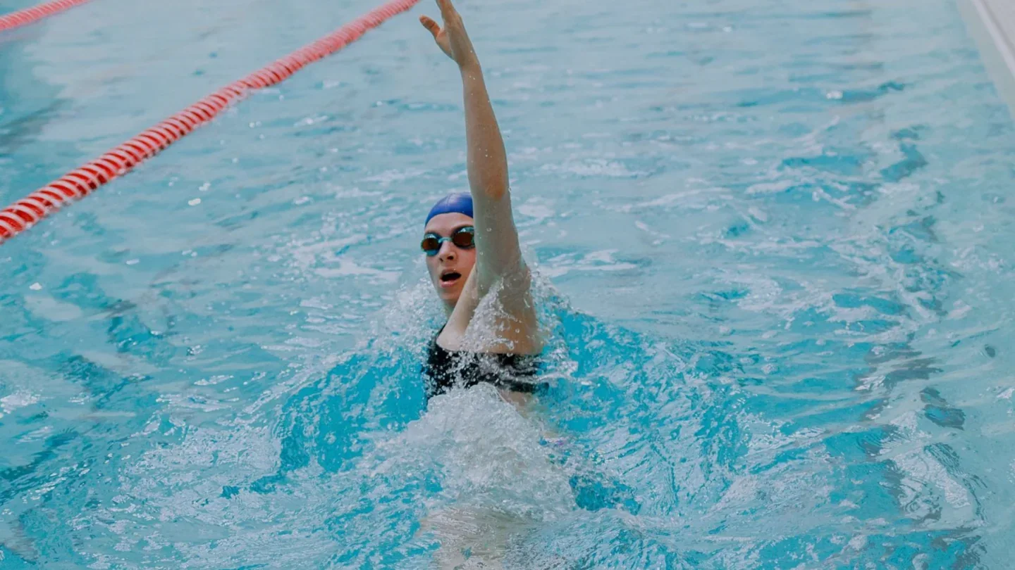 Swimmer practising a stroke at Hart House