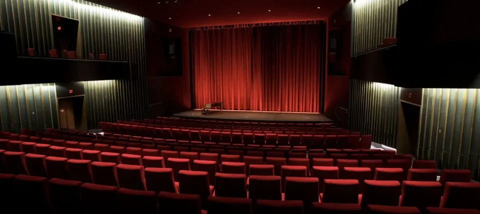 Rows of red cinema seats inside TIFF Lightbox