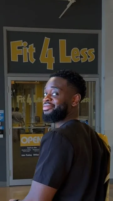 A person at a Fit4Less entrance