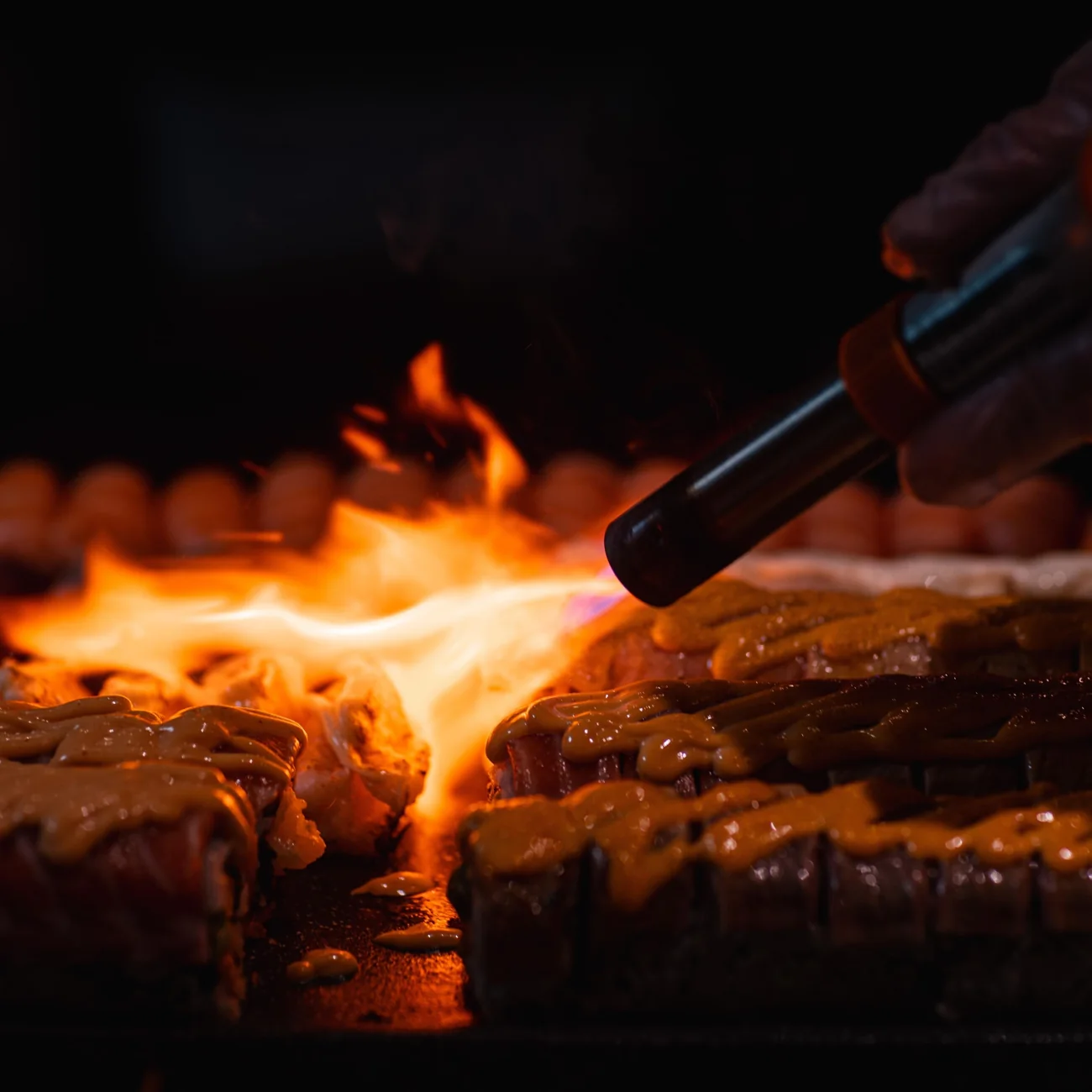 Torched sushi in a J San photograph