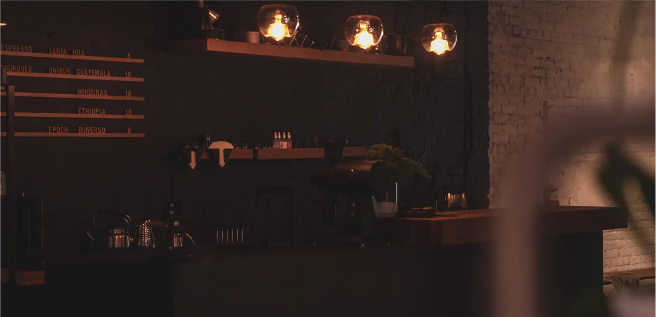 Counter and hanging lamps in KNIFE’s Slow Coffee Bar