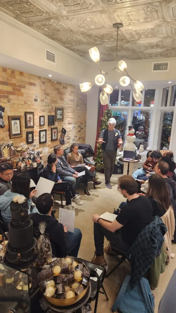 Players seated at tables in a room during a Changeling Gaming event