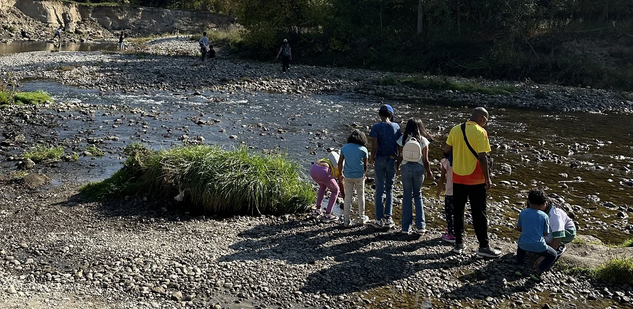 visitors at the TRCA adventures of salmon event enjoy a self-guided walk along a scenic stretch of Highland Creek in Scarborough