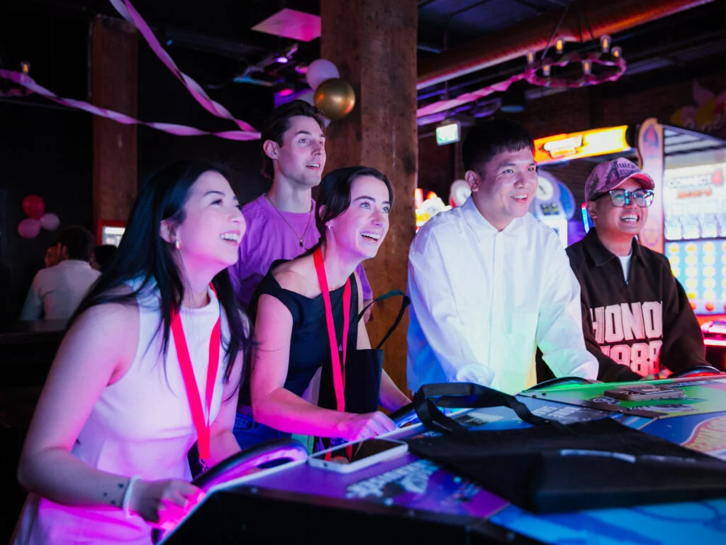 A group in GRETA's Toronto arcade-bar photography