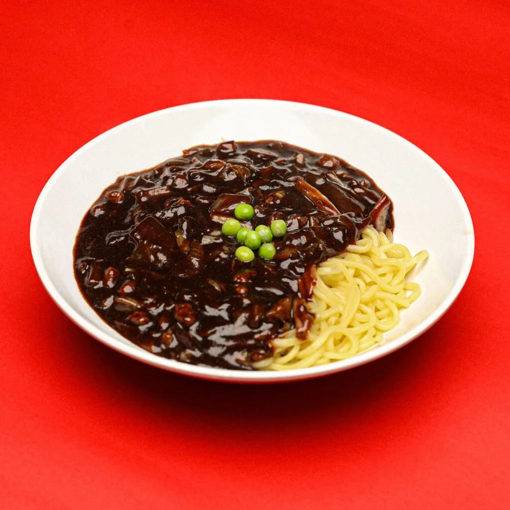 Black-bean noodles in Kim's Noodle's menu photography