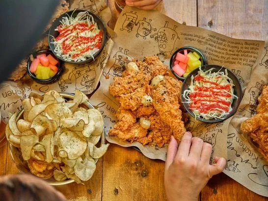Fried chicken and sides shown by Sarang Kitchen
