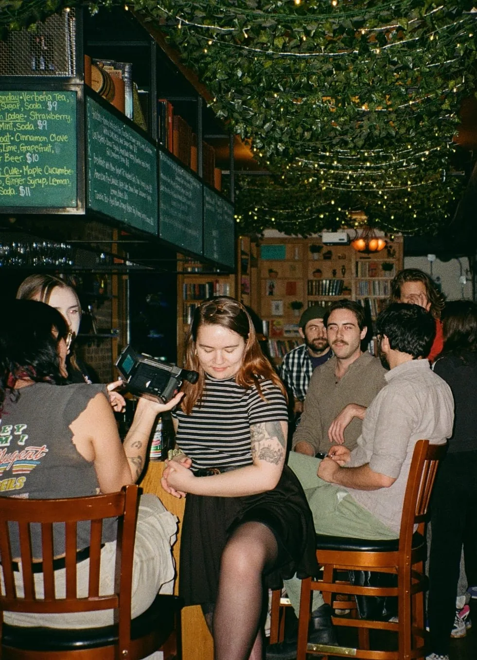 People talking at Danu Social House in a venue photograph